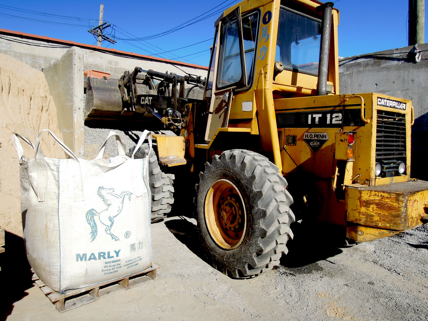 Loader with a bulk bag of material
