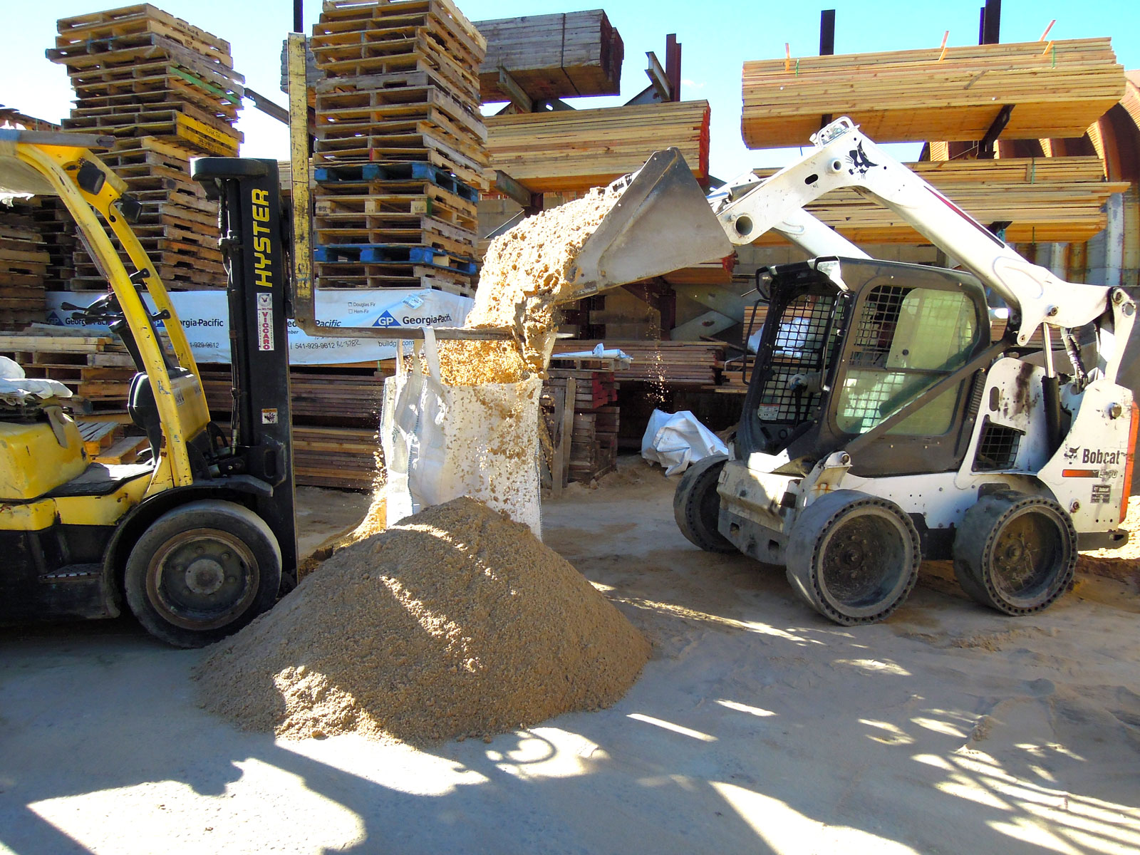 Skid steer and forklift moving aggregate