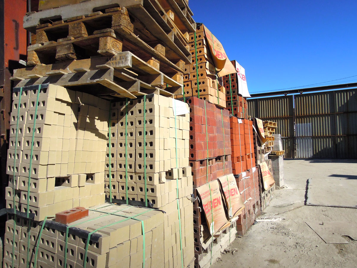 Banded brick cubes stacked in the yard