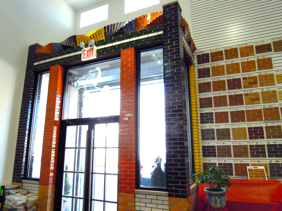 Sample wall beside the showroom entrance