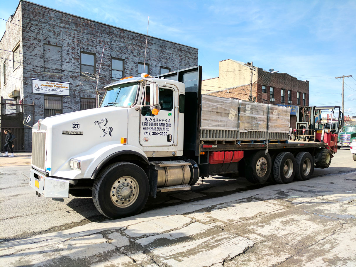Loaded flatbed heading out for the day